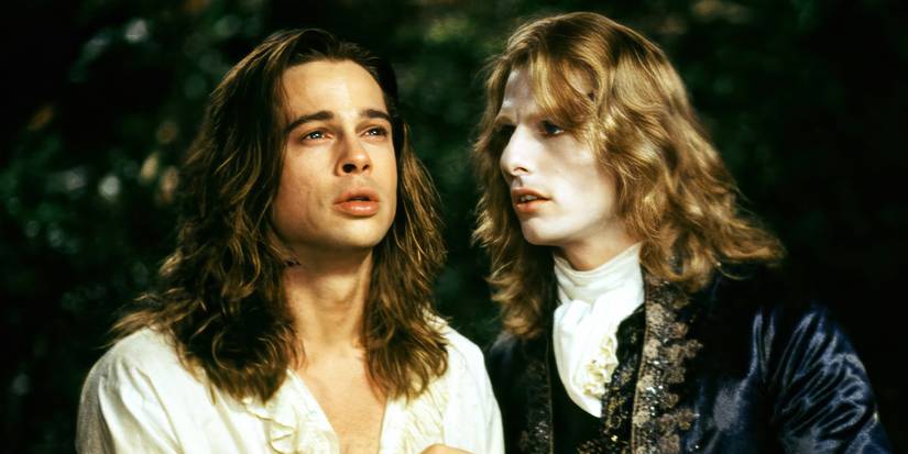 Tom Cruise and Brad Pitt talking at night in 'Interview With the Vampire'