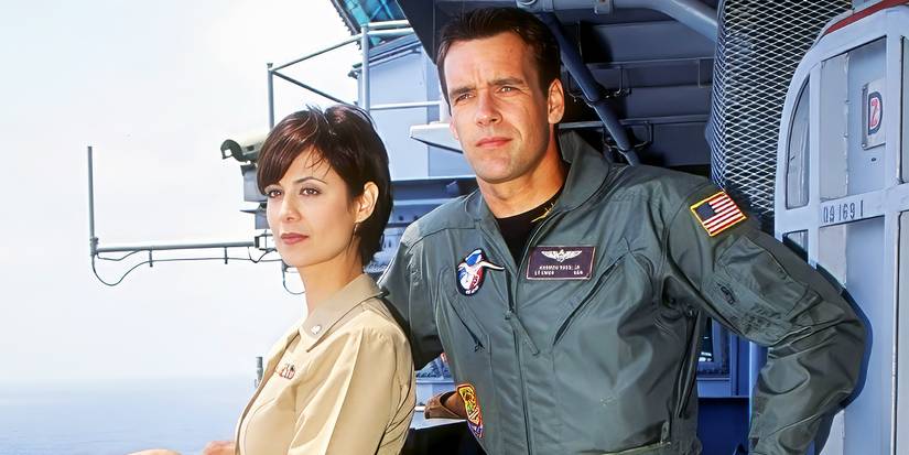 Sarah MacKenzie (Catherine Bell) and Harmon Rabb (David James Elliott) on a ship in 'JAG'Image 