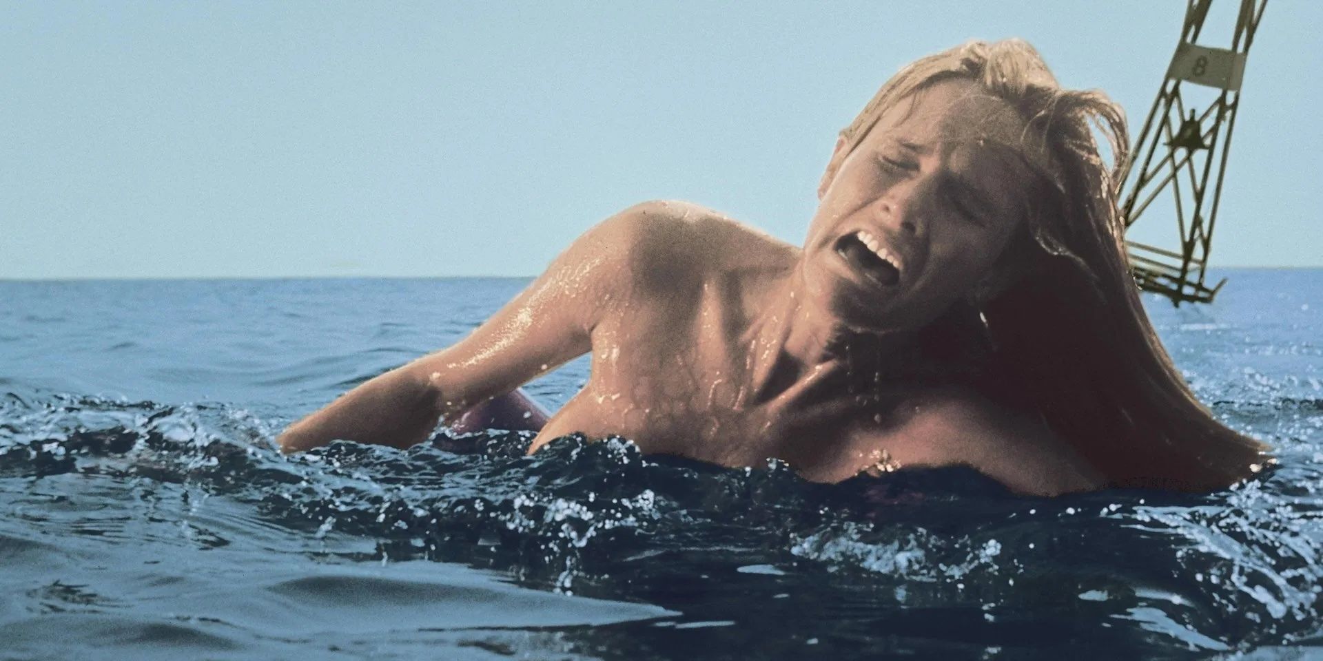 A crying woman swimming at sea in Jaws 
