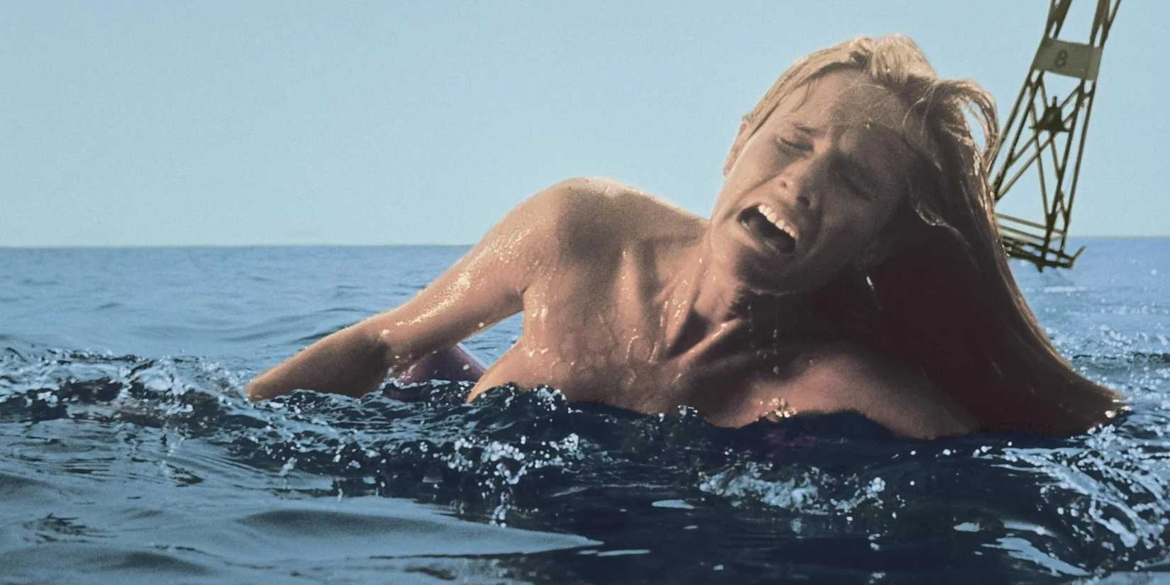A crying woman swimming at sea in Jaws