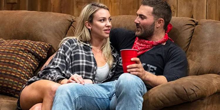 Calah and Steven cuddle on the couch on 'Joe Millionaire: For Richer or Poorer.'