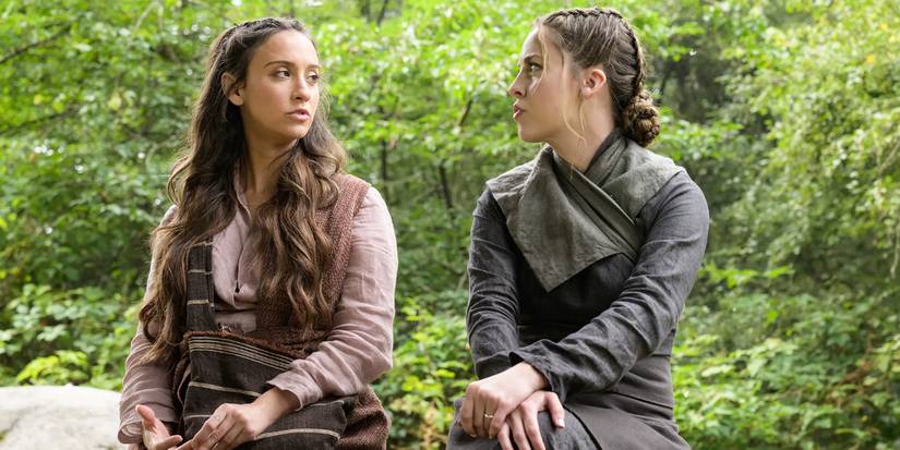 Julia (Stella Maeve) and Fen (Brittany Curran) talking in Fillory during Season 5 of 'The Magicians.'