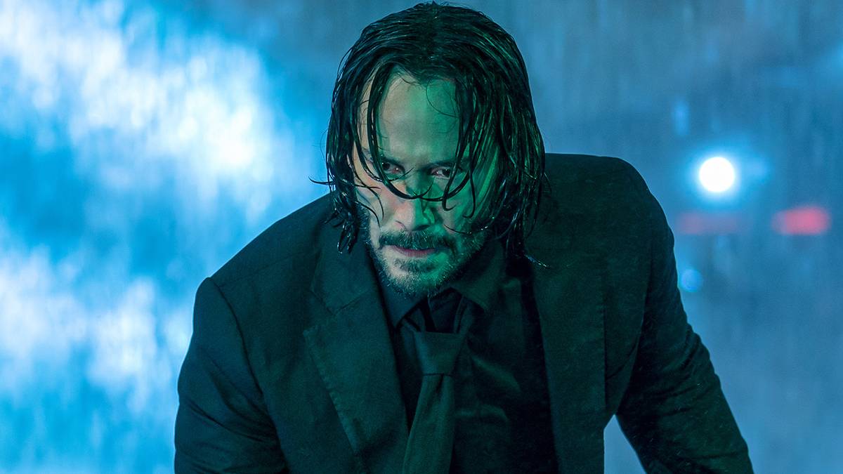 Keanu Reeves in the rain as John Wick in John Wick 4