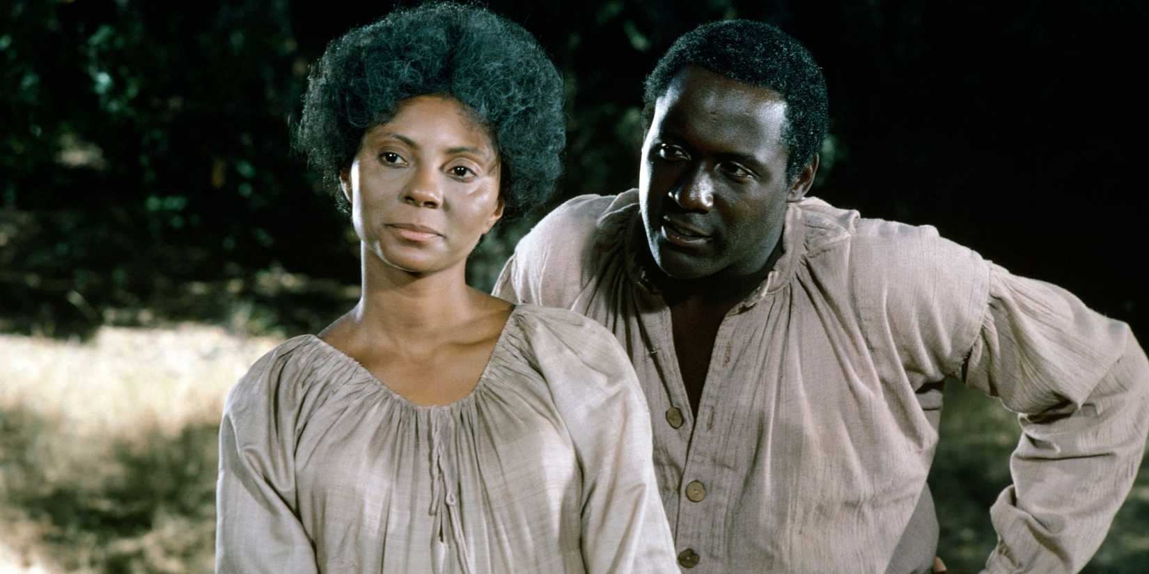 Leslie Uggams standing in front of Richard Roundtree in Roots 1977 miniseries.