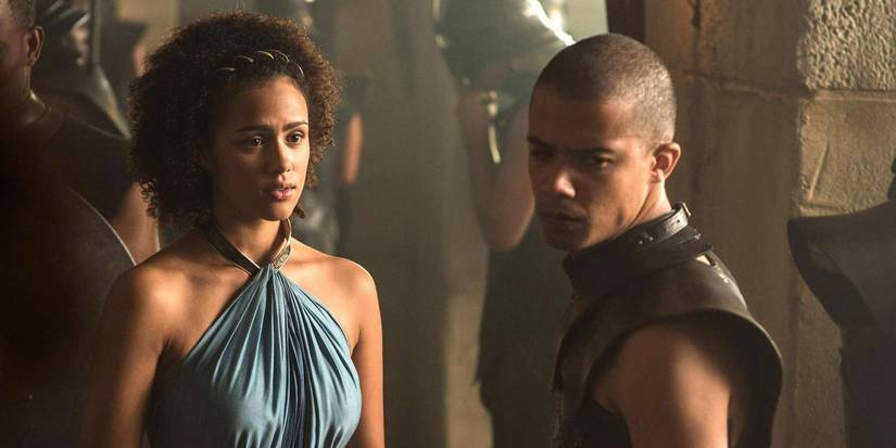 Missandei (Nathalie Emmanuel) and Grey Worm (Jacob Anderson) looking concerned in Game of Thrones.