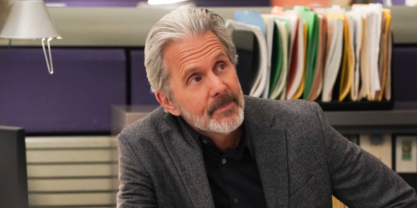 Gary Cole's Alden sitting in front of file folders and looking to the side in NCIS.