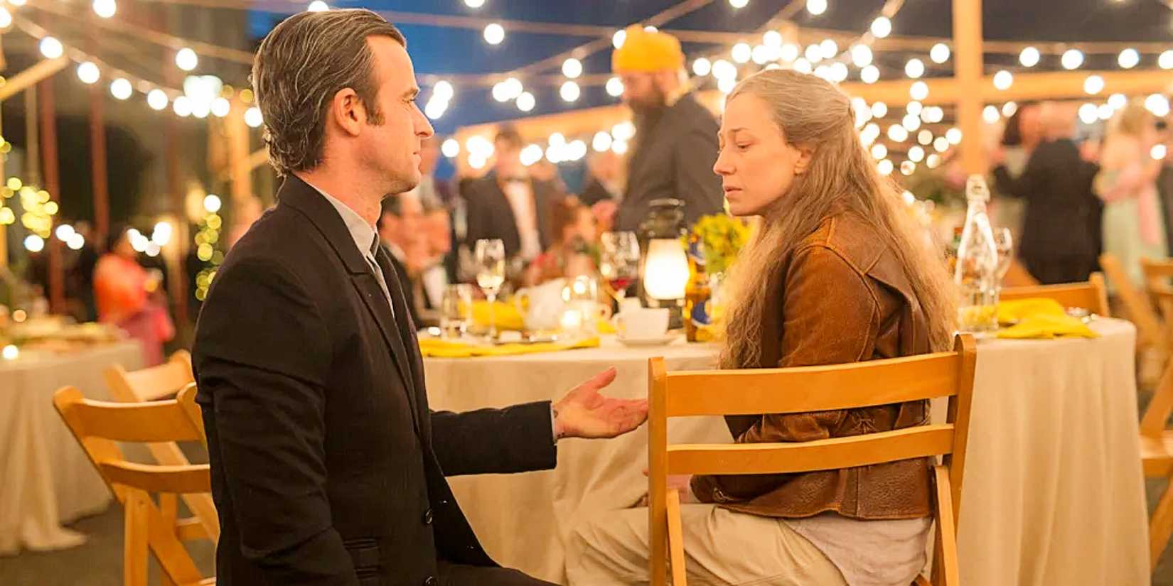 Older versions of Justin Theroux as Kevin Garvey and Carrie Coon as Nora Durst at a wedding together in the series finale of The Leftovers