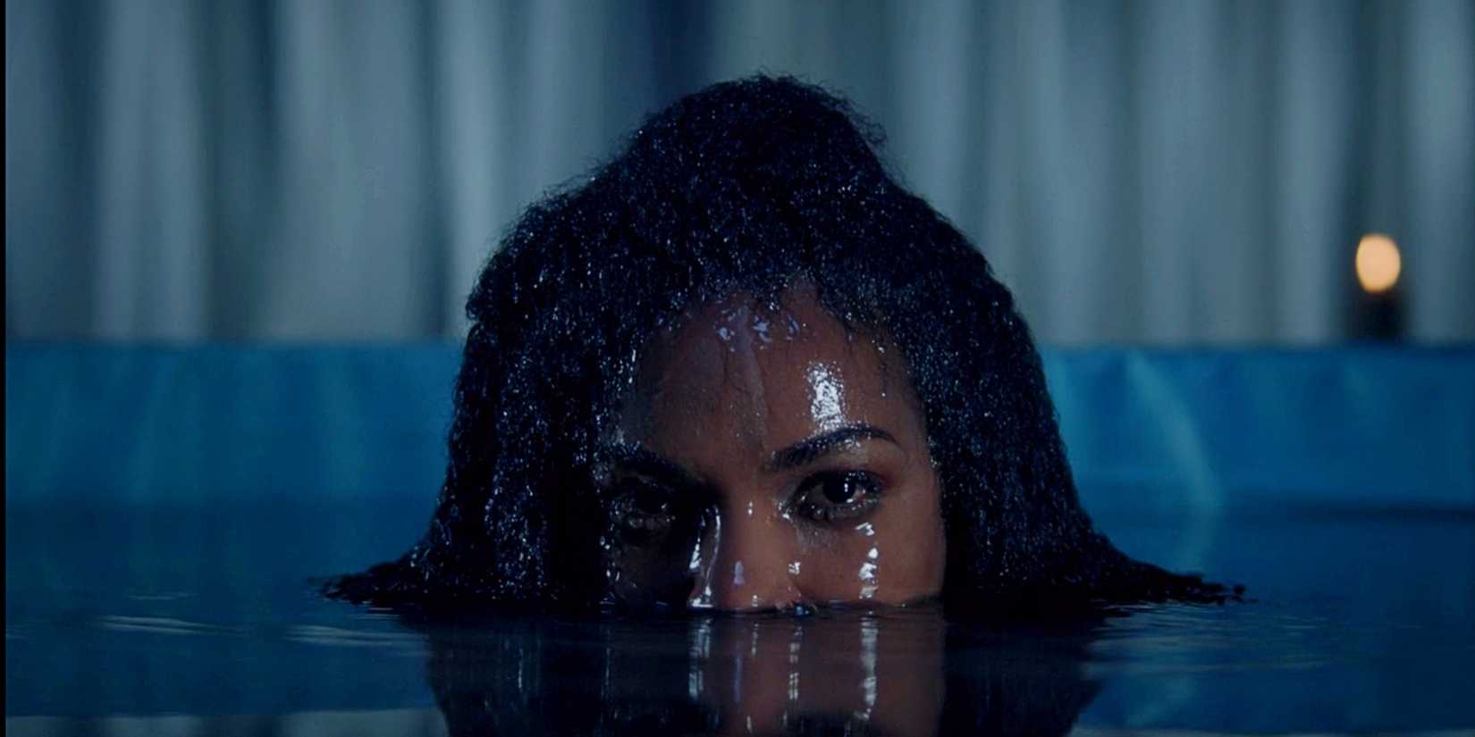 Mekia Cox as Nyla Harper resurfacing from a tub in The Rookie Season 5