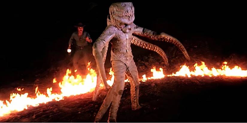 An man-octopus-type monster is surrounded by fire in Octaman.
