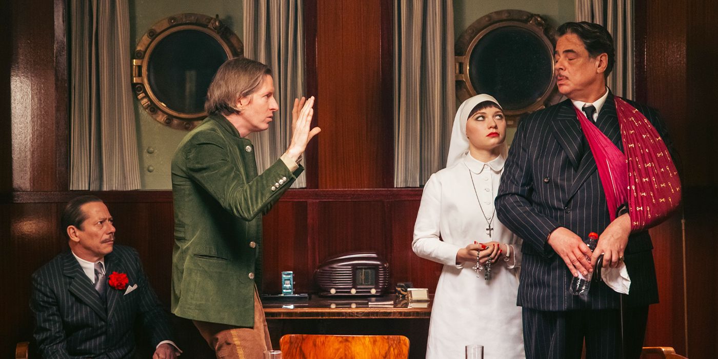 Wes Anderson directing Mia Threapleton and Benicio del Toro on the set of The Phoenician Scheme.