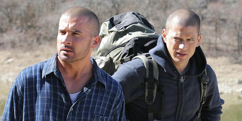 Dominic Purcell and Wentworth Miller outdoors looking to the side in Prison Break.