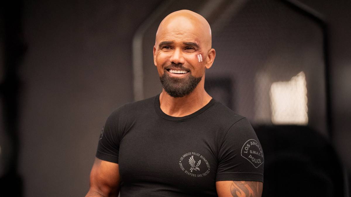 Shemar Moore as Hondo in SWAT smiles at something off-screen.