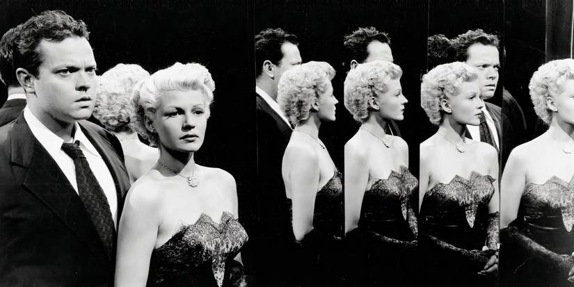 Orson Welles stands with Rita Hayworth in a hall of mirrors in The Lady from Shanghai. 