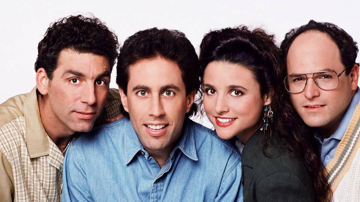 Michael Richards, Jerry Seinfeld, Julia Louis-Dreyfus, and Jason Alexander in a 'Seinfeld' cast photo.