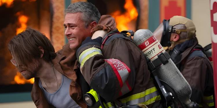 Severide (Taylor Kinney) bringing a victim to safety on Chicago Fire.