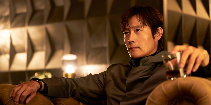 Frontman (Lee Byung-hun) sitting and watching the games in Squid Game Season 3.