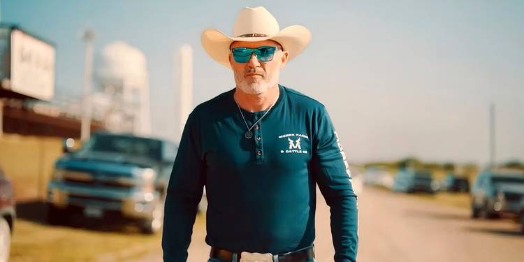 Steven McBee walking toward the camera on 'The McBee Dynasty: American Cowboys'