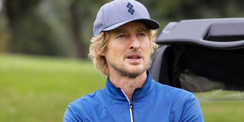 Owen Wilson as Pryce Cahill, wearing a blue shirt and grey baseball cap in 'Stick'