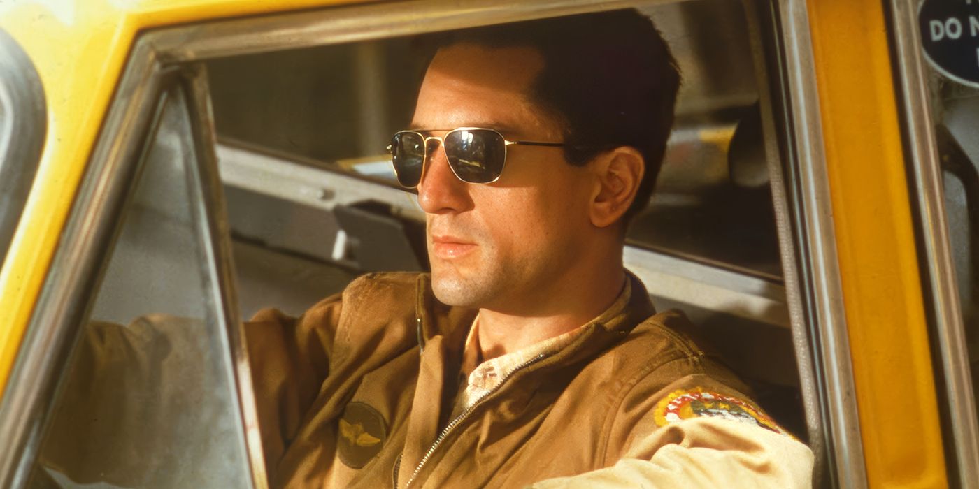 Robert De Niro as Travis Bickle in his cab in Taxi Driver