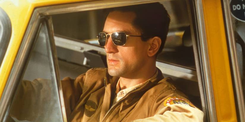 Robert De Niro as Travis Bickle in his cab in Taxi Driver