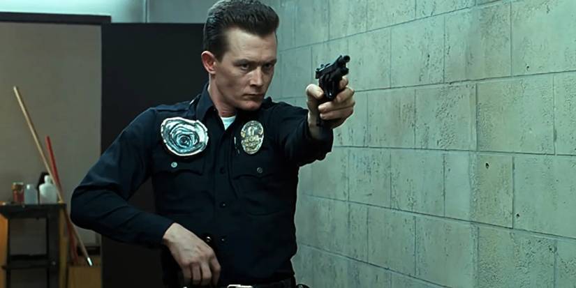 The T1000 aiming a gun in Terminator 2: Judgment Day