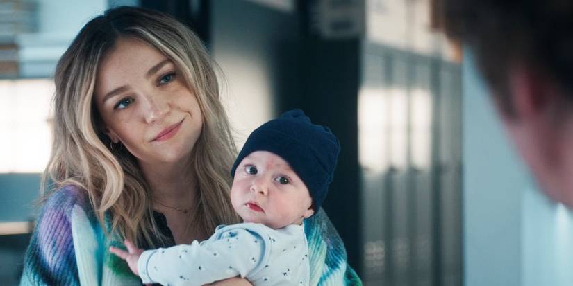 Abby Elliott as Sugar holding newborn baby Sophie in Season 4 of The Bear