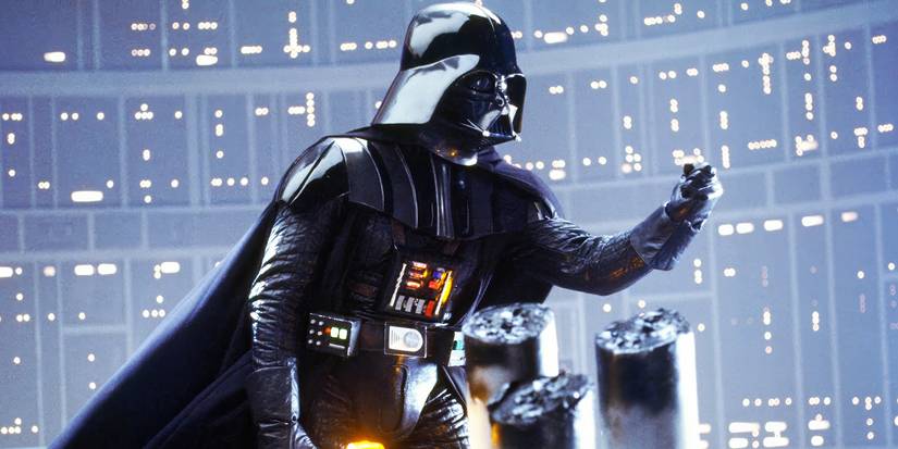 Darth Vader reaches his hand out in Empire Strikes Back.