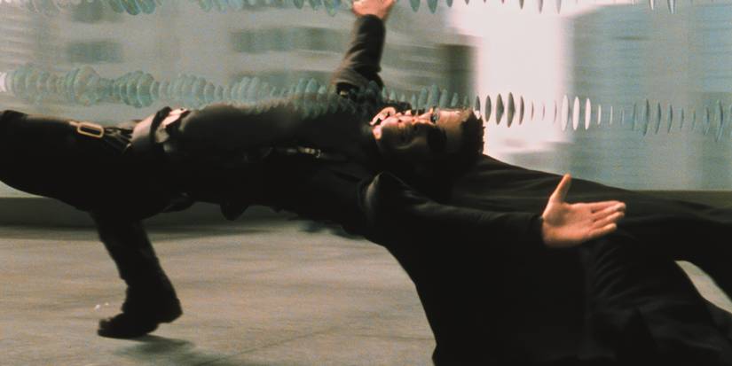 Keanu Reeves as Neo doging bullets in the Matrix