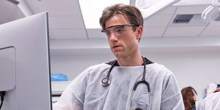 Patrick Ball as Dr. Langdon in The Pitt