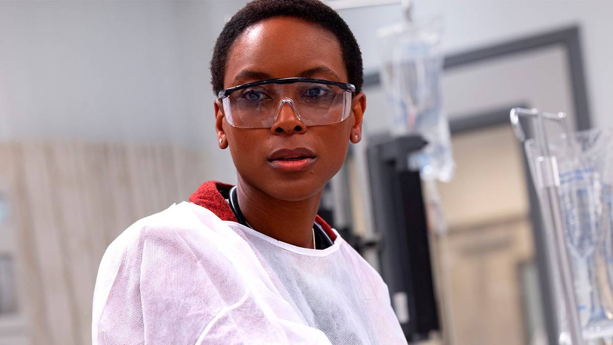 Tracy Ifeachor with her goggles and protective gear on in The Pitt.