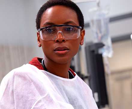 Tracy Ifeachor with her goggles and protective gear on in The Pitt.