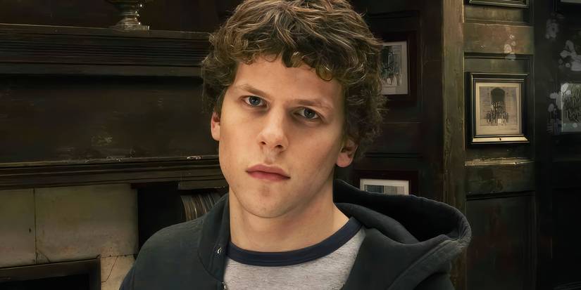 Jesse Eisenberg as Mark Zuckerberg looking at the camera in The Social Network