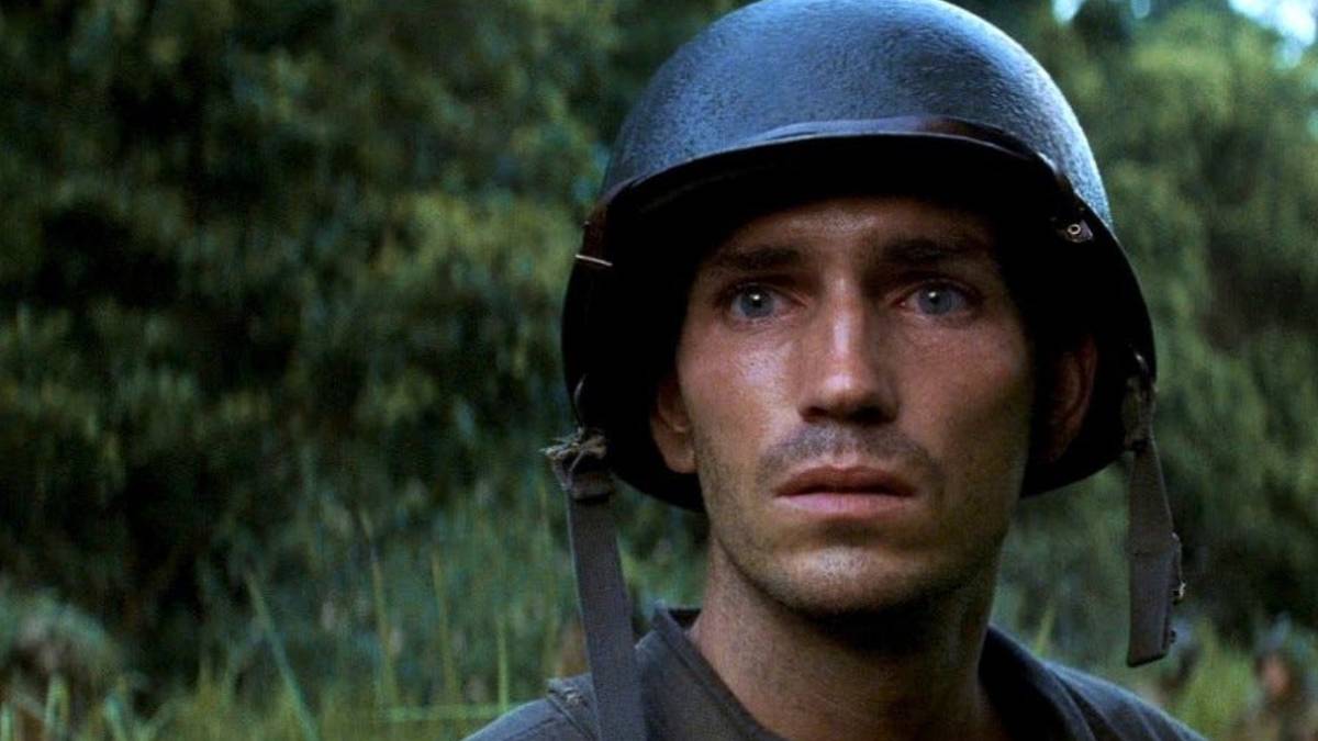 Jim Caviezel looking ahead with teary eyes in The Thin Red Line - 1998