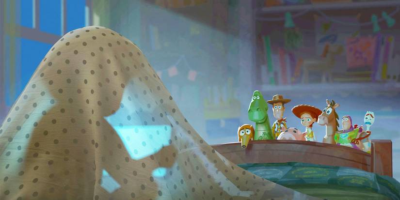 The toys watch a child play with a tablet in 'Toy Story 5'