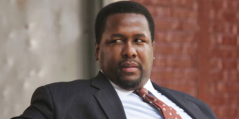 Bunk sitting on a bench in 'The Wire.'