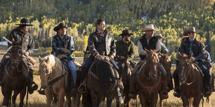 The cast of Yellowstone season 1, episode 1, Daybreak sit on horses and look at something off-screen.