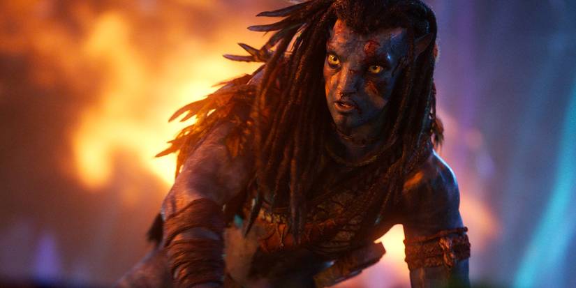Sam Worthington as Jake Sulley with a fire behind him in 'Avatar: Fire and Ash'