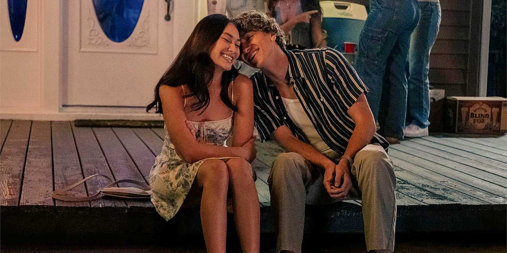 Belly Conklin and Jeremiah Fisher cuddling at a party in The Summer I Turned Pretty TSITP Season 3.