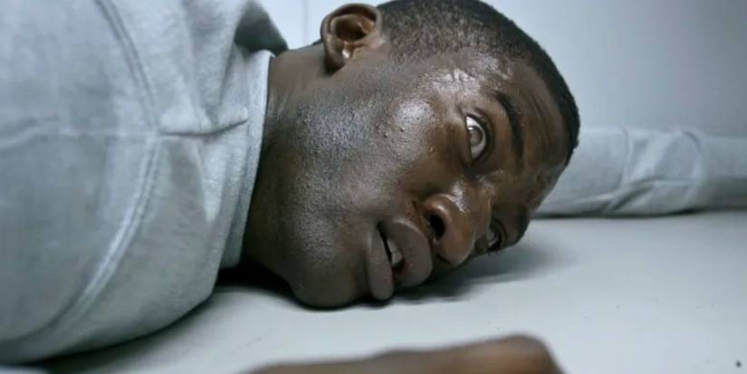Malachi Kirby as Stripe with screen in his eyes in Black Mirror, Season 3, Episode 5, "Men Against Fire."