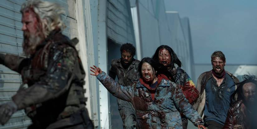 Running zombies chasing someone in 'Black Summer'
