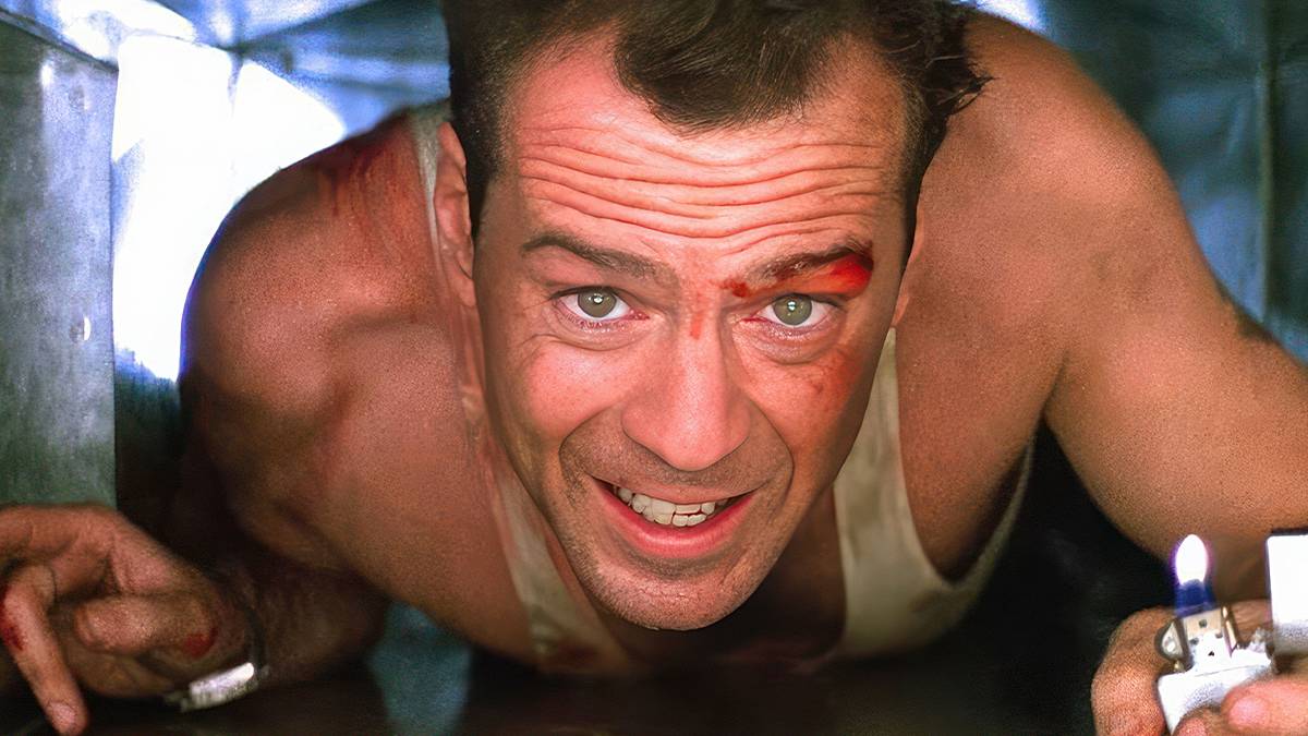 Bruce Willis, playing John McClane, crawls through a duct with a lighter in Die Hard. 