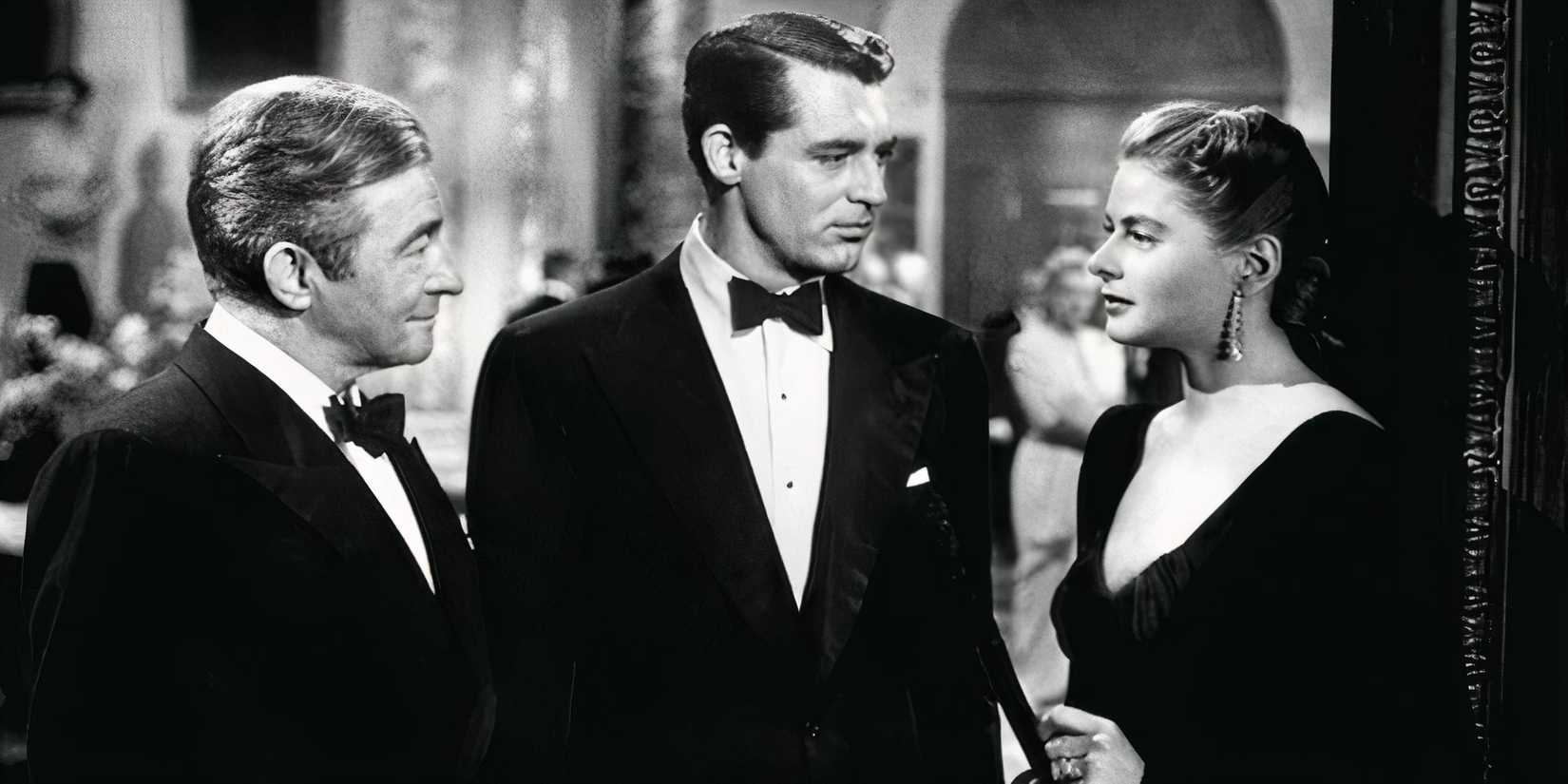 Calude Rains standing next to Cary Grant who are both looking at Ingrid Bergman standing with them in _Notorious (1946)