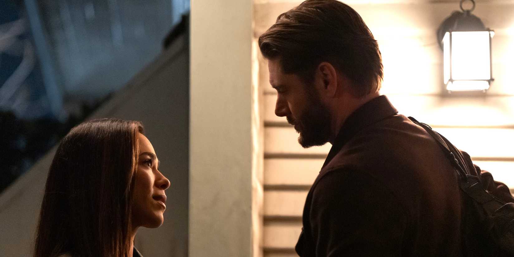 Jessica Camacho as Oliveras and Jensen Ackles as Meachum looking at each other in Countdown
