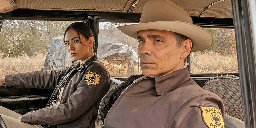 Jessica Matten as Bernadette Manuelito, Zahn McClarnon as Joe Leaphorn in a car in Dark Winds.