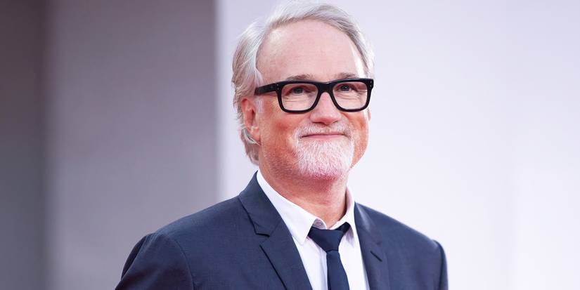 David Fincher smiles during a red carpet event