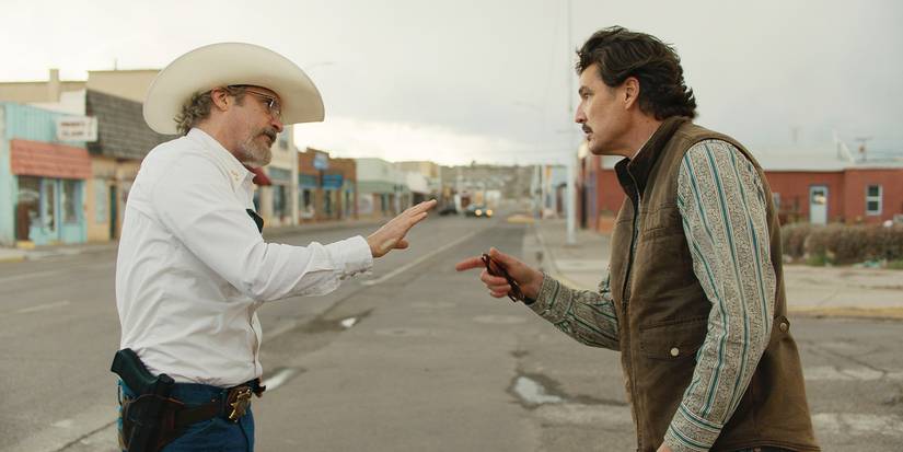 Sheriff Joe Cross and Mayor Ted Garcia at arguing on a main street in Eddington