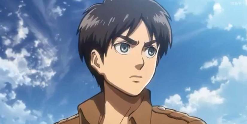 Eren Yeager looks to the side against a clear sky from Attack on Titan