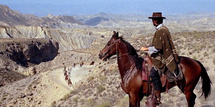 A cowboy on horseback in the desert in For a Few Dollars More