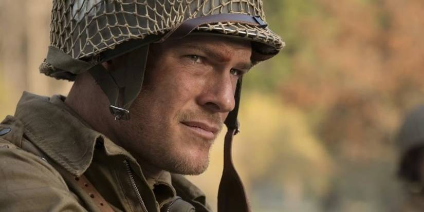Close-up of Alan Ritchson as Butchie, looking at something in Ghosts of War 