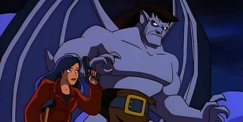 'Gargoyles' characters Goliath and Elisa standing together, voiced by Keith David and Salli Richardson respectively.